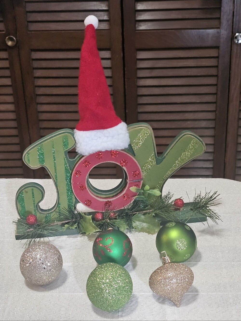 Christmas Wooden Tabletop “JOY” Sign | Red & Green Santa Hat Holiday Decor
